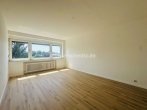 Wohnzimmer 2.OG - 8-PARTEIEN-MEHRFAMILIENHAUS MIT NEUEM VERMIETUNGSPOTENZIAL!