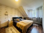 Schlafzimmer DG - 8-PARTEIEN-MEHRFAMILIENHAUS MIT NEUEM VERMIETUNGSPOTENZIAL!
