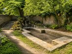 denkmalgeschützte Grotte - ALTBAU-CHARME AUSSEN, MODERNER WOHNKOMFORT INNEN – DREI WOHNEINHEITEN & PARKÄHNLICHER GARTEN